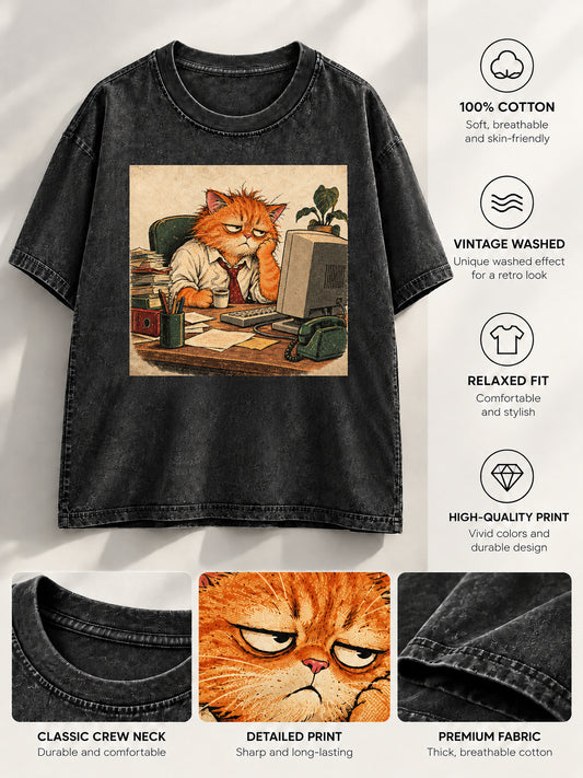 Black t-shirt displaying tired office cat artwork with product detail feature callouts